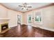 Bright living room with hardwood floors and access to a sunroom at 100 E Rockway St, Durham, NC 27704