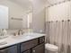 Bathroom with single vanity and shower/tub combo at 112 Roundrock Ln, Sanford, NC 27330