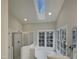 Bathroom boasts a large bathtub, shower, and skylight at 113 Crosswind Dr, Cary, NC 27513