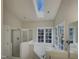 Bathroom boasts a large bathtub, shower, and skylight at 113 Crosswind Dr, Cary, NC 27513