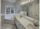 Bathroom features double vanity, soaking tub, and separate shower at 113 Crosswind Dr, Cary, NC 27513