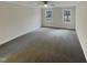 Large bedroom with gray carpet and ceiling fan at 113 Crosswind Dr, Cary, NC 27513