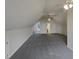 Spacious bonus room with carpet flooring and two doors at 113 Crosswind Dr, Cary, NC 27513
