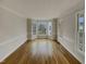 Bright dining room with hardwood floors and bay window at 113 Crosswind Dr, Cary, NC 27513
