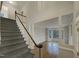 Elegant staircase leading to the upper level of the home at 113 Crosswind Dr, Cary, NC 27513