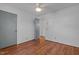 Bedroom with hardwood floors, ceiling fan and gray doors at 1818 Carr Creek Rd, Sanford, NC 27332