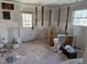 Under construction bathroom with toilet and bathtub at 203 Hope St, Erwin, NC 28339