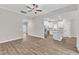 Modern kitchen with white shaker cabinets, granite counters, and stainless steel appliances at 204 Brickwell Way, Youngsville, NC 27596