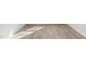 Wood-look flooring in a bright room at 208 Leven Dr, Gibsonville, NC 27249