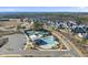 Aerial view of community amenities, including pool, tennis, and pickleball courts at 235 Cottage Way, Pittsboro, NC 27312