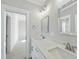 Double vanity bathroom with a view of another bedroom at 235 Cottage Way, Pittsboro, NC 27312
