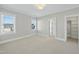 Bright bedroom with large windows and walk-in closet at 235 Cottage Way, Pittsboro, NC 27312