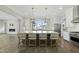 Modern kitchen with stainless steel appliances and a large island at 235 Cottage Way, Pittsboro, NC 27312