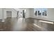 Spacious living room with hardwood floors and large windows at 235 Cottage Way, Pittsboro, NC 27312