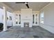 Outdoor patio with fireplace and seating area at 235 Cottage Way, Pittsboro, NC 27312