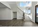 Elegant staircase with dark wood railing at 235 Cottage Way, Pittsboro, NC 27312