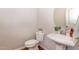 Small powder room with pedestal sink and toilet at , Durham, NC 27703