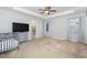 Spacious bedroom with large windows and neutral carpeting at , Durham, NC 27703