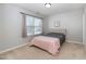 Well-lit bedroom with carpeted floor and neutral walls at , Durham, NC 27703