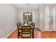 Charming dining area with hardwood floors and access to backyard at , Durham, NC 27703