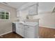 Kitchen with white cabinets and quartz countertops at 2813 Delco Ct, Raleigh, NC 27610