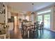 Kitchen features a dining area, access to deck, and tile flooring at 340 Andrews Store Rd, Pittsboro, NC 27312