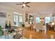 Open and airy living room with hardwood floors, access to screened porch at 340 Andrews Store Rd, Pittsboro, NC 27312