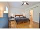 Main bedroom with a king-size bed and hardwood floors at 340 Andrews Store Rd, Pittsboro, NC 27312