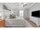 Main bedroom with hardwood floors and large windows at 5516 Wallace Martin Way, Raleigh, NC 27616