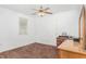 Spacious bedroom with a dresser and ceiling fan at 60 Stone Place Rd, Dunn, NC 28334