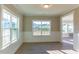 Bright dining room with wainscoting and large windows at 1048 Fairhaven Dr # 99, Mebane, NC 27302