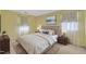 Well-lit bedroom featuring a comfortable bed and tasteful decor at 105 Mercia Cir, Durham, NC 27703