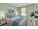 Serene bedroom with light green walls and a cozy atmosphere at 105 Mercia Cir, Durham, NC 27703