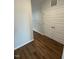 Clean and bright hallway with wood flooring and storage at 1055 Westerland Way # 37, Durham, NC 27703