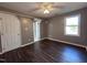 Bedroom with laminate flooring, a closet, and window at 106 Bradley Dr, Benson, NC 27504