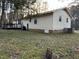 Home exterior showcasing a deck and spacious backyard at 204 Hemlock Dr, Durham, NC 27705