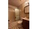 Clean bathroom with shower/tub combo and wood vanity at 204 Hemlock Dr, Durham, NC 27705