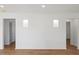 Bright hallway with recessed lighting and hardwood floors at 207 Cloverdale Dr, Smithfield, NC 27577