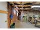 Unfinished basement with exposed brick and utilities at 216 W Thorndale St, Oxford, NC 27565