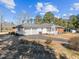 Ranch home exterior showcasing attached garage and private driveway at 216 W Thorndale St, Oxford, NC 27565