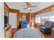 Spacious living room with wood paneling and hardwood floors at 216 W Thorndale St, Oxford, NC 27565