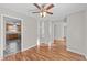 Bright dining room with hardwood floors and kitchen access at 27 Gray Ghost St, Benson, NC 27504