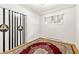 Simple bedroom with carpet flooring and black and white closet doors at 2726 Bellemont Alamance Rd, Burlington, NC 27215