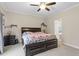 Main bedroom with King bed, ceiling fan and private bathroom access at 280 Gwendolyn Way, Fuquay Varina, NC 27526