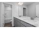 Modern bathroom with double vanity and a separate tub and shower at 409 Reinsman Ct, Mebane, NC 27302