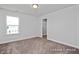 Bright bedroom with window, closet and carpet at 409 Reinsman Ct, Mebane, NC 27302
