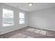 Bright bedroom featuring neutral walls and plush carpeting at 409 Reinsman Ct, Mebane, NC 27302