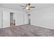 Bright bedroom featuring carpet, ceiling fan and access to bathroom at 409 Reinsman Ct, Mebane, NC 27302