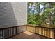 Private deck overlooking backyard with wooded area at 5147 Sandy Banks Rd, Raleigh, NC 27616