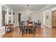 Bright breakfast nook features hardwood floors and a round table at 52302 Fowle, Chapel Hill, NC 27517